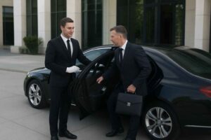 Professional chauffeur providing point-to-point car service for a business executive in downtown Houston.