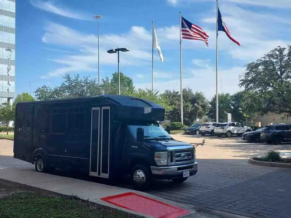 Houston airport shuttle bus rental with luggage space for group transfers